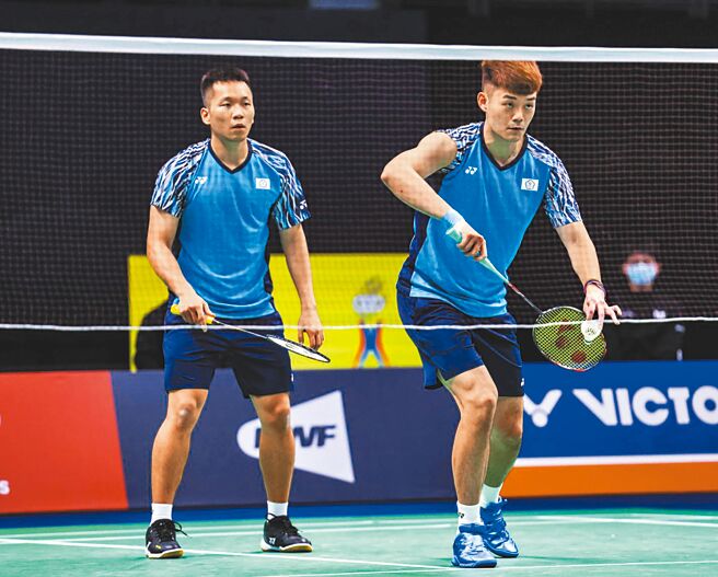 李洋（左）、王齐麟（右）在2022年汤姆斯盃小组赛为中华队拿下1点胜利。（Badminton Photo提供）