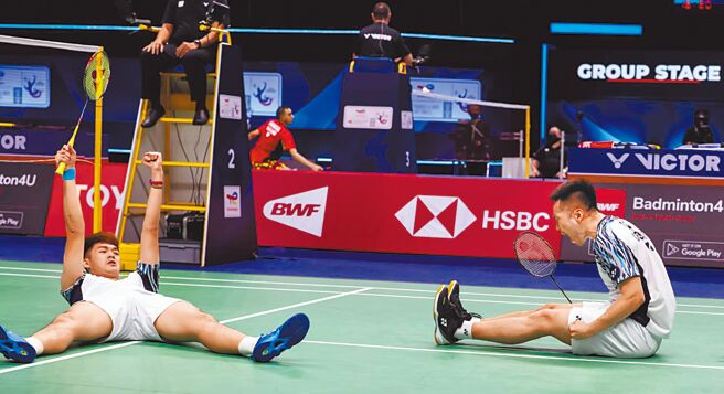 李洋（右）、王齐麟（左）击败印度组合后激动庆祝。（Badminton Photo提供）