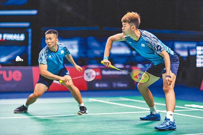 李洋（左）、王齐麟（右）在汤姆斯盃8强赛为中华队守下1点。（Badminton Photo提供）