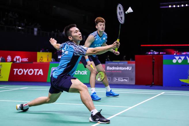 李洋（前）和队友王齐麟于泰国羽球公开赛晋级到男双8强。（Badminton Photo提供）